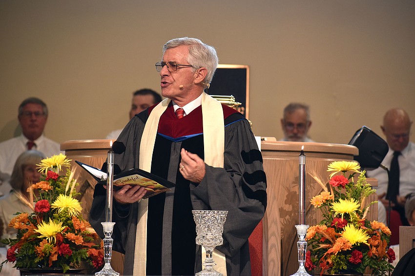 The Rev. Norm Pritchard welcomes congregants to the 37th annual Thanksgiving Interfaith Service.