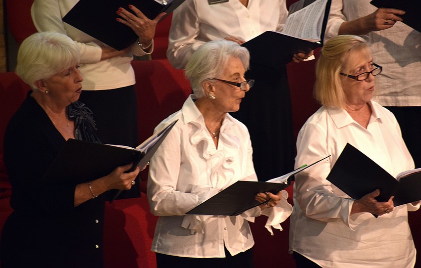 The interfaith choir sang throughout the interfaith service.