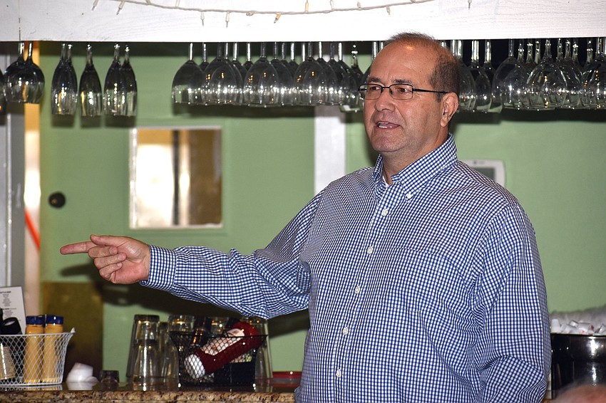 Incoming Town Manager Tom Harmer addresses the crowd. Harmer’s first day with the town is Dec. 11.