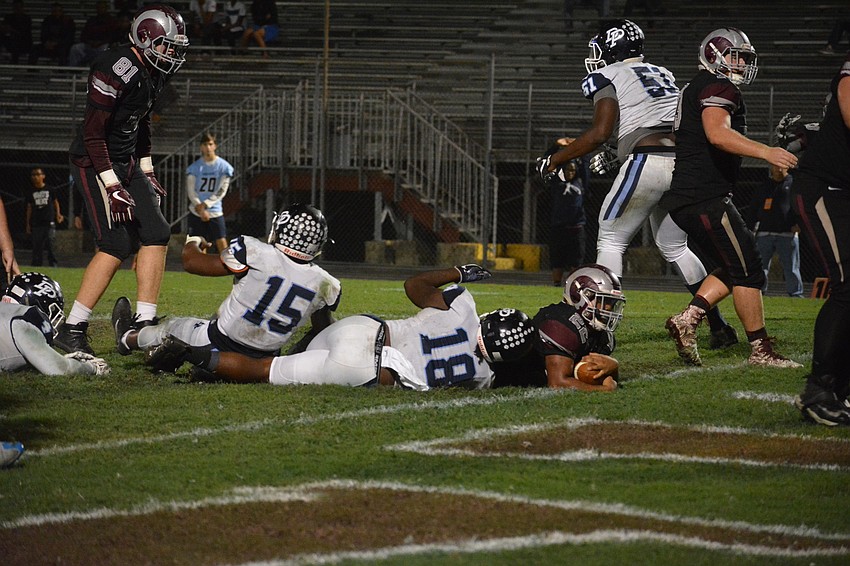 Ali Boyce falls on the goal line in the second half after a short run. After some debate among the officiating crew, the play was ruled a Rams touchdown.