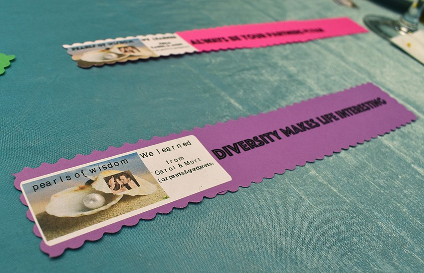 The couples’ children and grandchildren printed “pearls of wisdom” that they’ve learned from the Sieglers and placed them on tables at the reception.