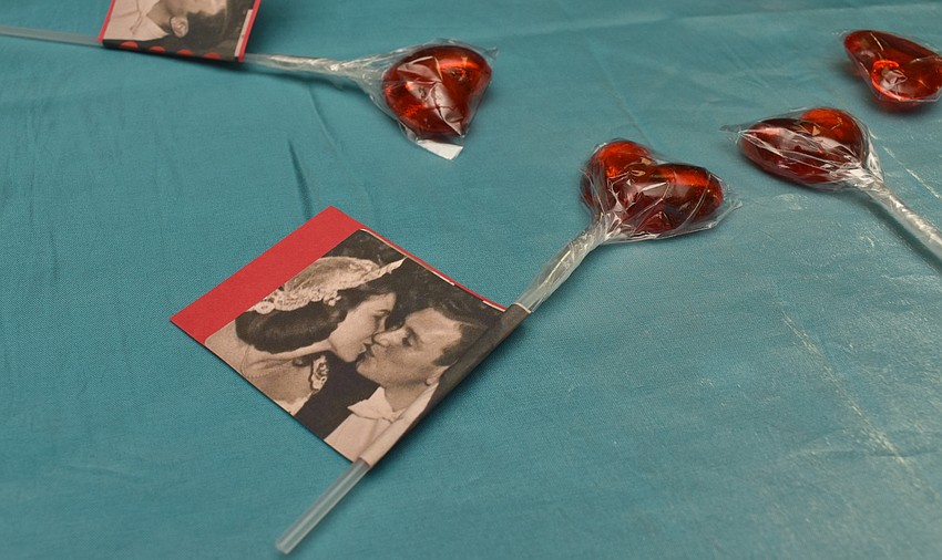 The couples’ children and grandchildren decorated the tables with heart suckers adorned with photos of the couple.