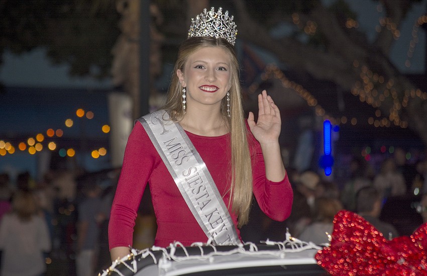 Miss Siesta Key Morgan Hough rides in the Siesta Key holiday parade.