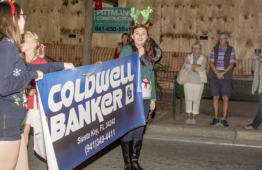 Sarah Green marches in the Siesta Key holiday parade
