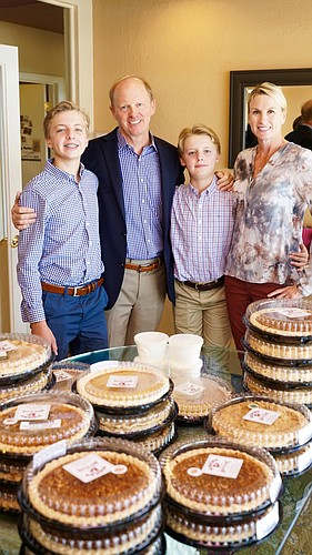 The Pettingell family handed out Thanksgiving pies to clients on Nov. 22. Any leftover pies were given to local food shelters. Courtesy photo.