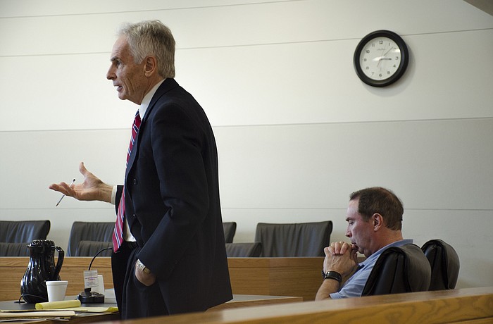Michael Gelety, left, argues the Longboat Key Police Departments claim of seizure a condo at 623 Cedars Court belonging to his client, Wayne Natt, Nov. 21 at the Manatee County Judicial Center.