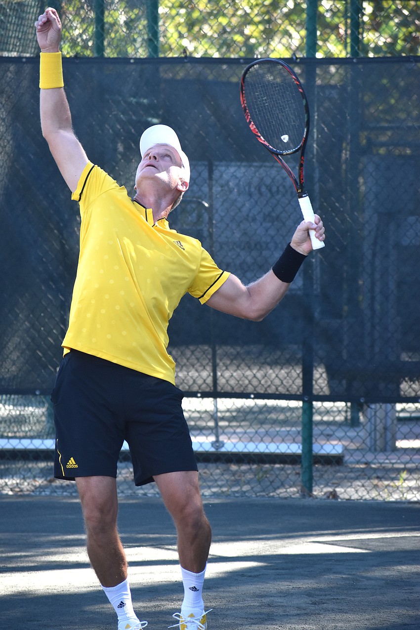 Erik-Jan Walson serves during the Senior Clay Courts Super Category II Tournament.