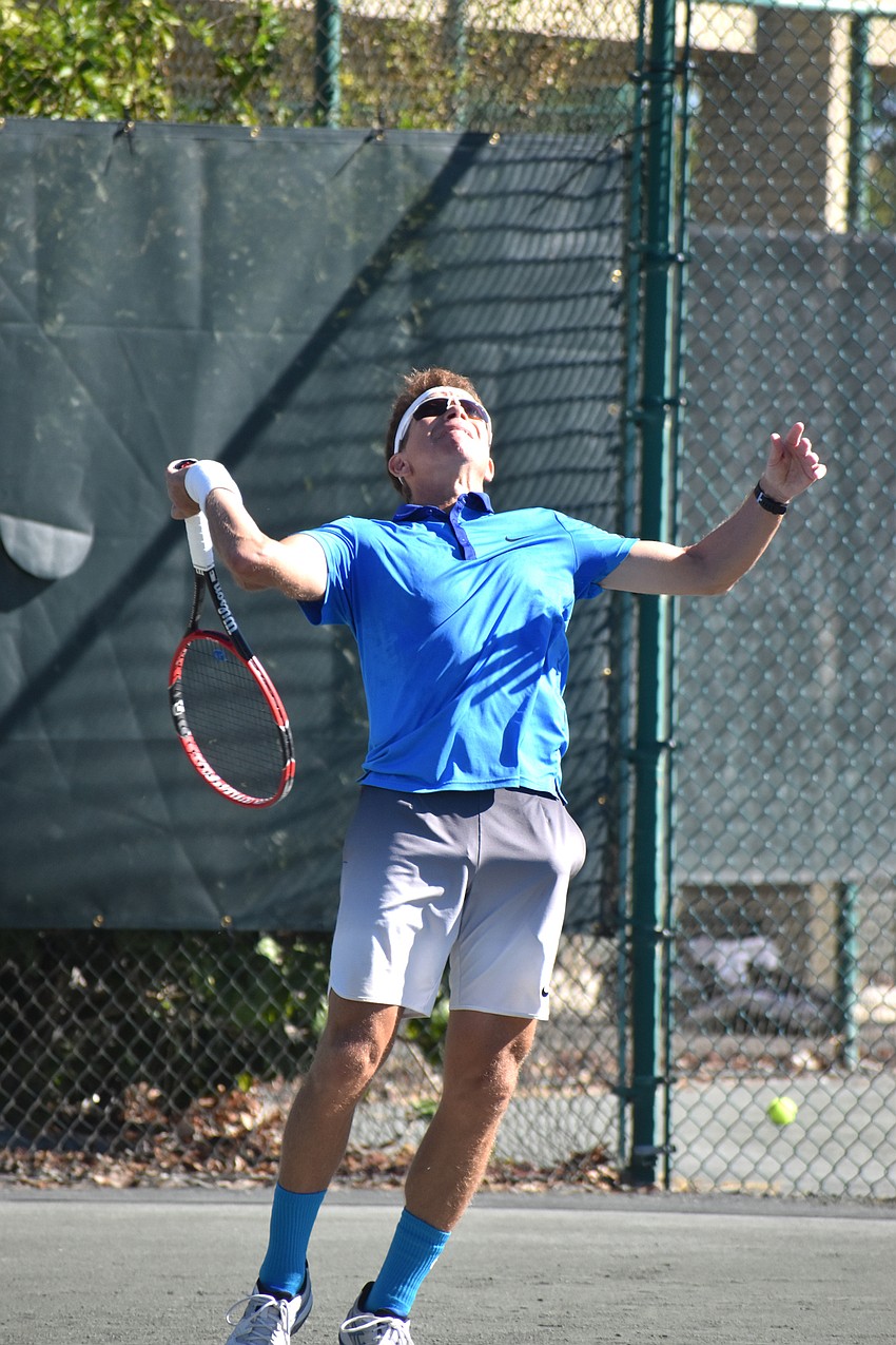 Eric Friedman serves during the Senior Clay Courts Super Category II Tournament.