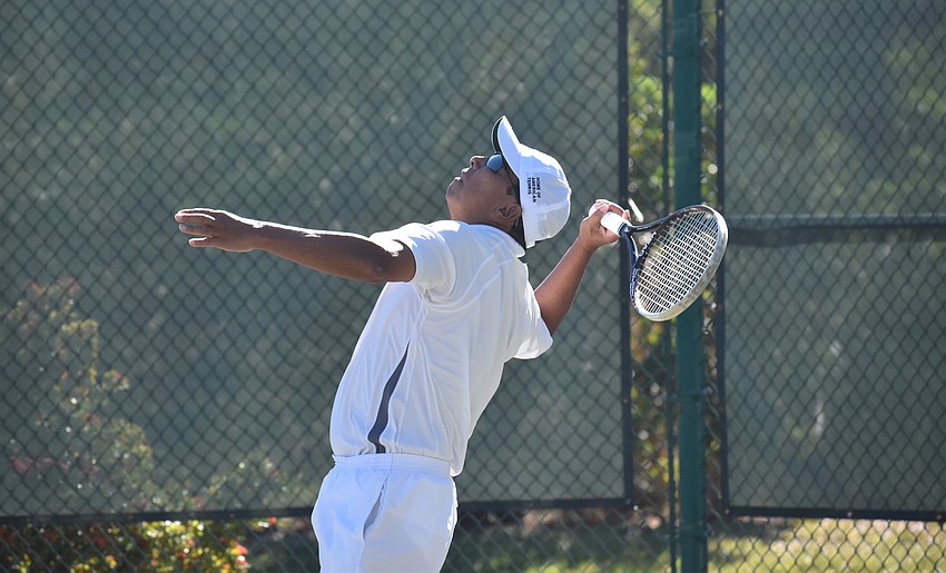 Mas Kimball serves to competitor Larry Turville.
