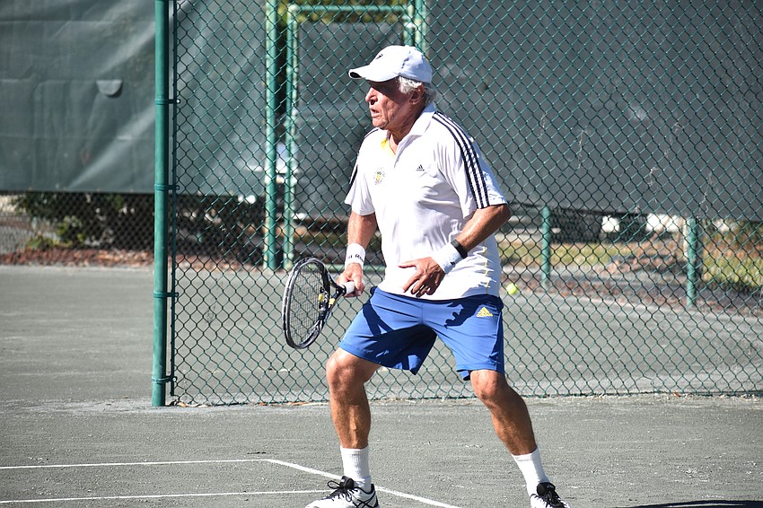 Barry Shollenberger gets ready to receive during the Senior Clay Courts Super Category II Tournament.