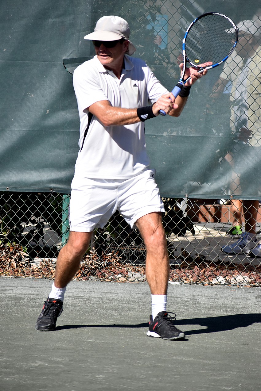 Rill Baxter gets ready to receive a serve.