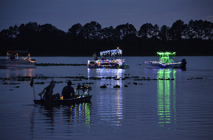 A boat makes its way to Linger Lodge during the 2015 parade.