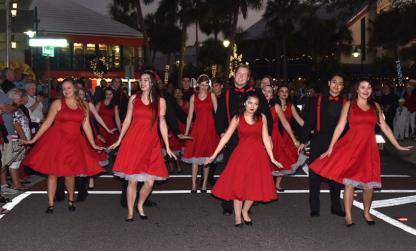 The Sarasota High School Drama Department dance troupe performs for the crowd.