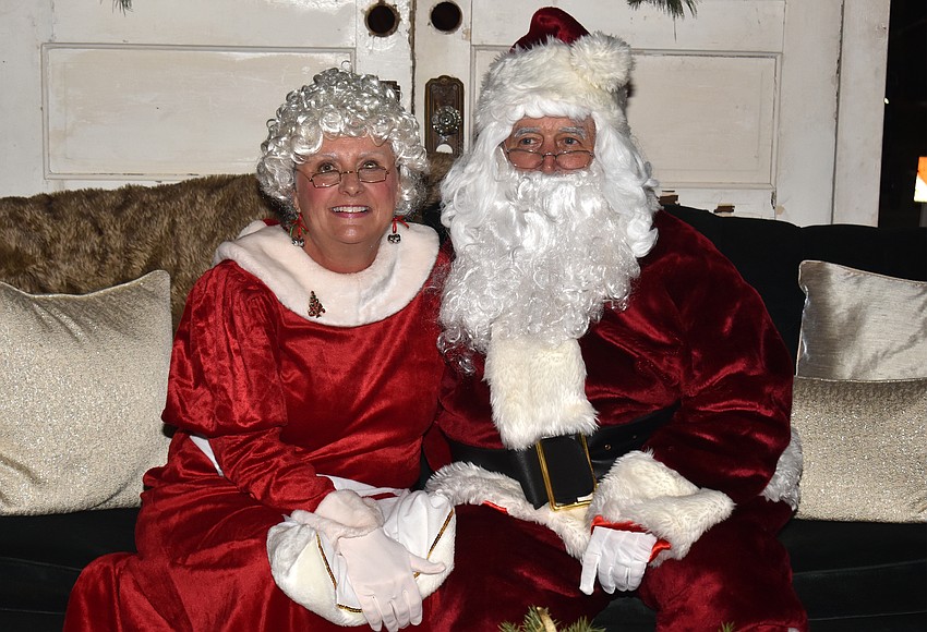 Mrs. Claus and Santa get ready to meet the kids.