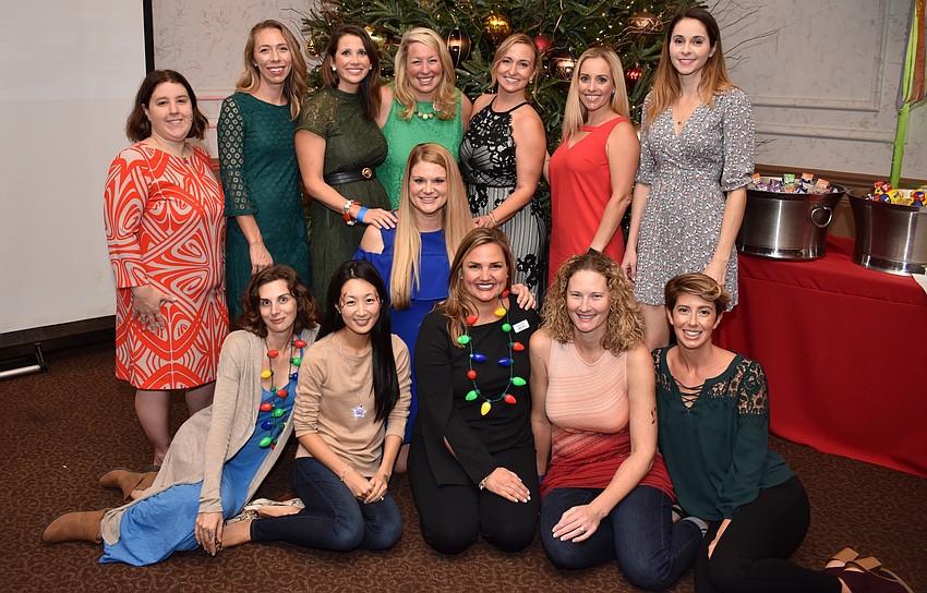 The Christmas in Candyland committee included several returning members from past years.