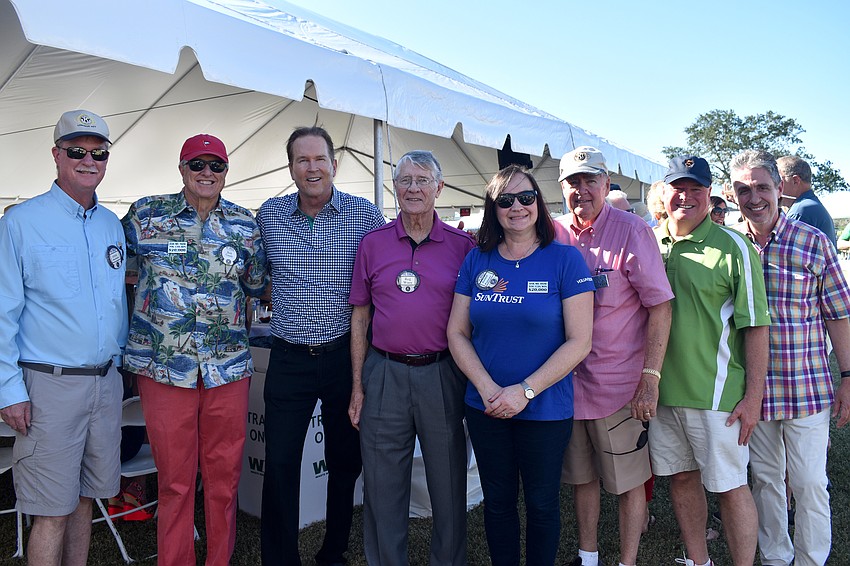 Kiwanis Club President Steve Branham, lawn party chairman Bob Gault, Congressman Vern Buchanan, Reg Ware, lawn party chairwoman Asima Palmer, lawn party chairman Glenn Peterson, Jack Brill and Michael Garey