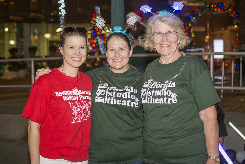Abigail Altier, Laura Adams and Kathy Jones of Florida Studio Theater pose in the staging area the downtown Sarasota holiday parade.