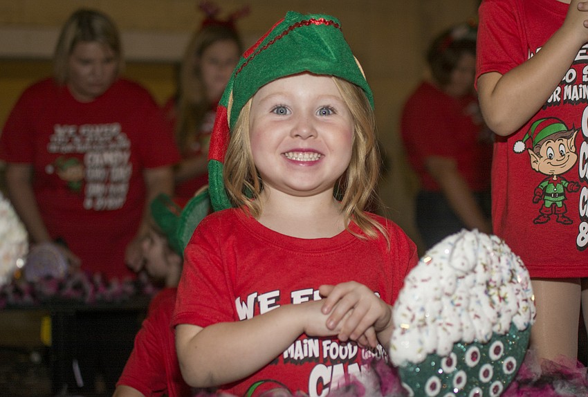 Adalae Gamso waits to participate in the annual downtown Sarasota holiday parade.