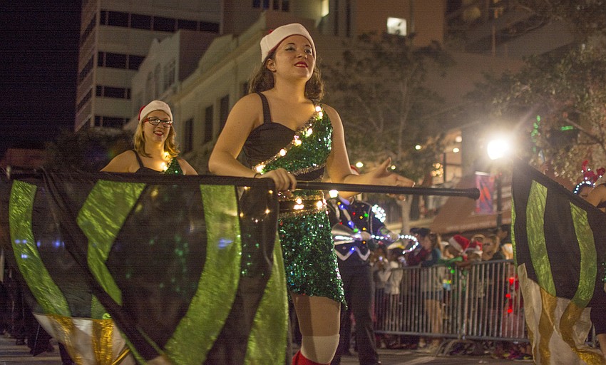 The Venice High School marches in the downtown Sarasota holiday parade.