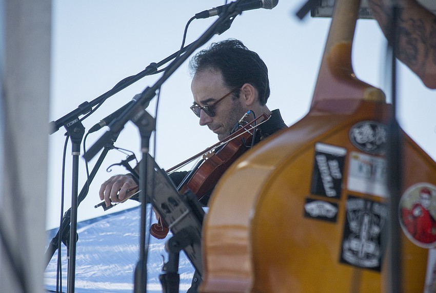 Jacob Lawson of the Hard Luck Society performs during the annual Siesta Beach Seafood and Music Festival.