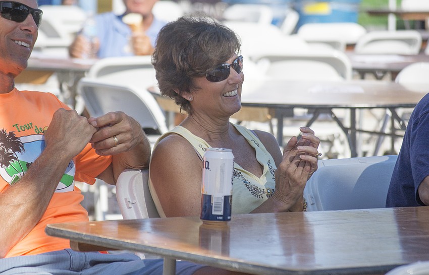 Georgine Ustruck enjoys the Hard Luck Society during the annual Siesta Beach Seafood and Music Festival.