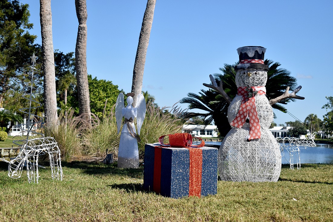 Reindeer, a snowman and a present highlight the entrance way to Spanish Main Yacht Club.
