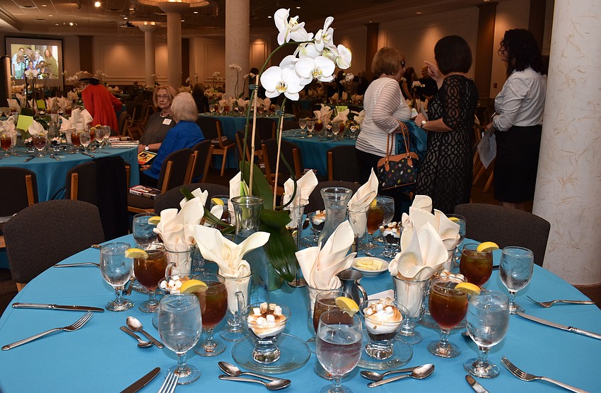 Every table was adorned with an orchid centerpiece.