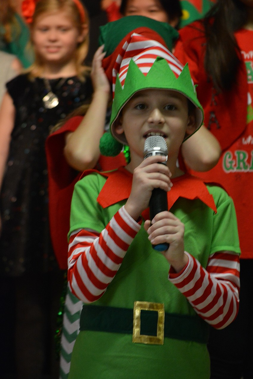 Elf Ben Schappacher, 10, talks about how the new elf, Elfis, does not fit in with the other elves.