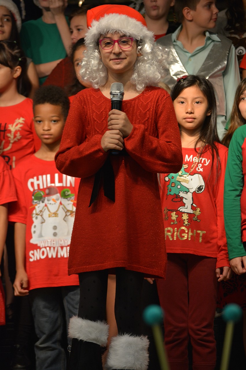 Mrs. Claus, portrayed by  Breana Nasser, sings about how people should not judge one another based on appearance.