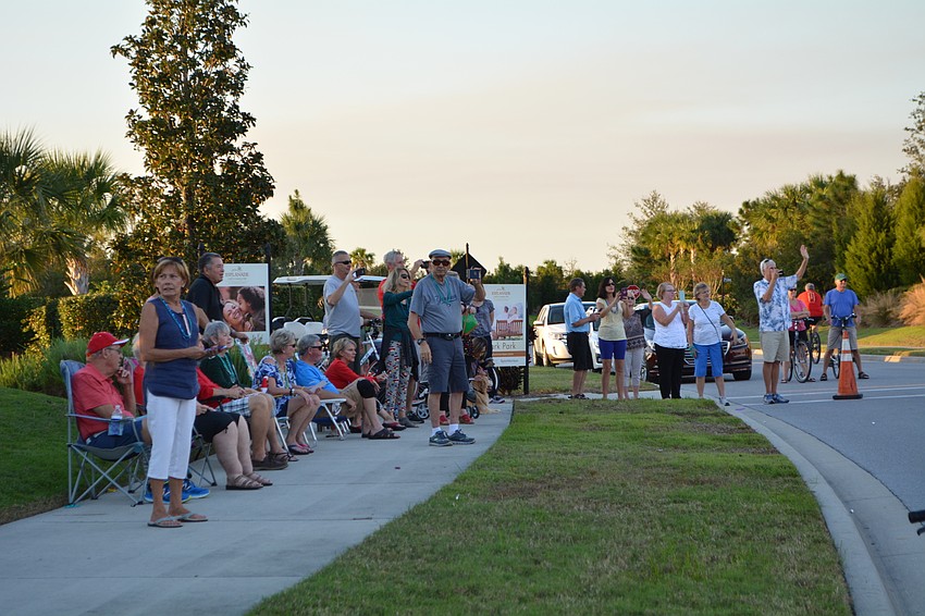 Esplanade residents gathered at key parade areas or in their front yards to watch the parade.