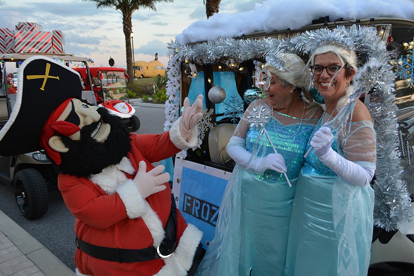 Hernando Desoto surprises Jill Brewer and Beverly Pullen, who had a 