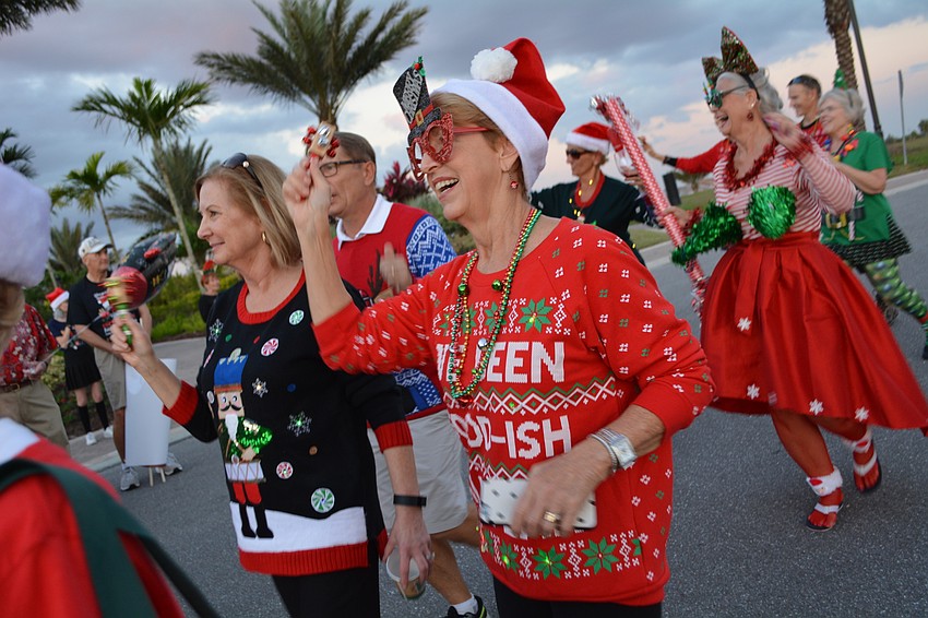 Lynn Gelsomin shows off her sweater as a walker in the 