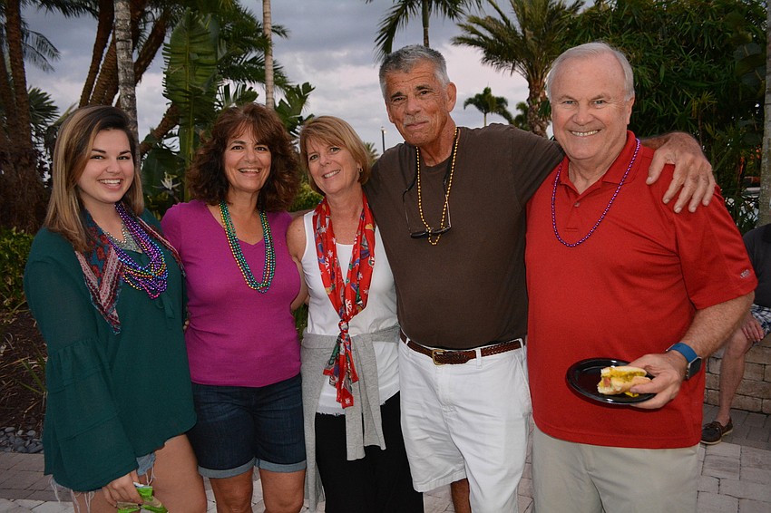 Kelsey Chinskey, Shelley Chinskey, Valerie Wolf, Tim Chinskey and Jack Wolf enjoy time together at the wellness center after the parade.