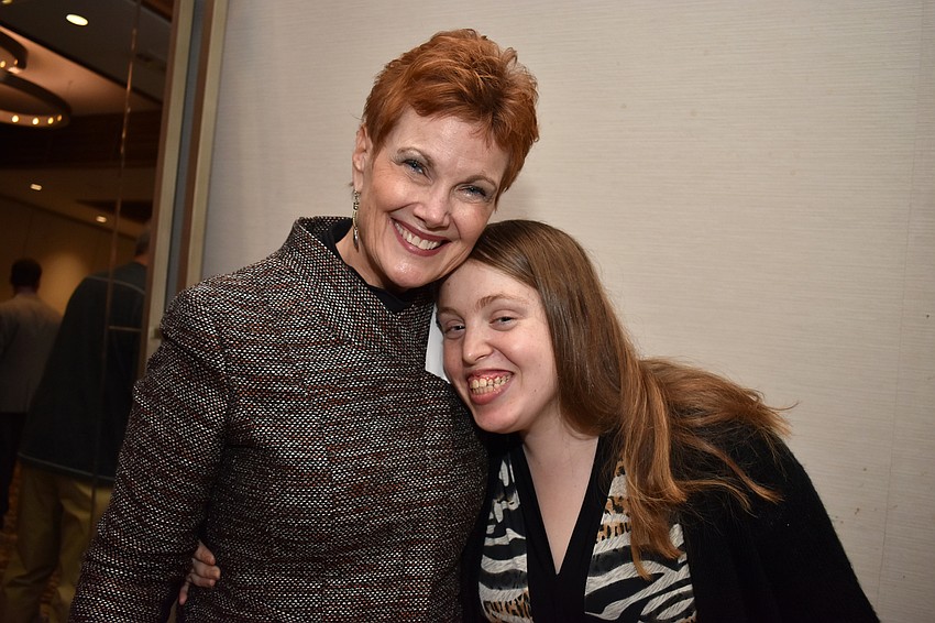 Director of Compeer Sarasota Lynn Buehler and Ashley W.