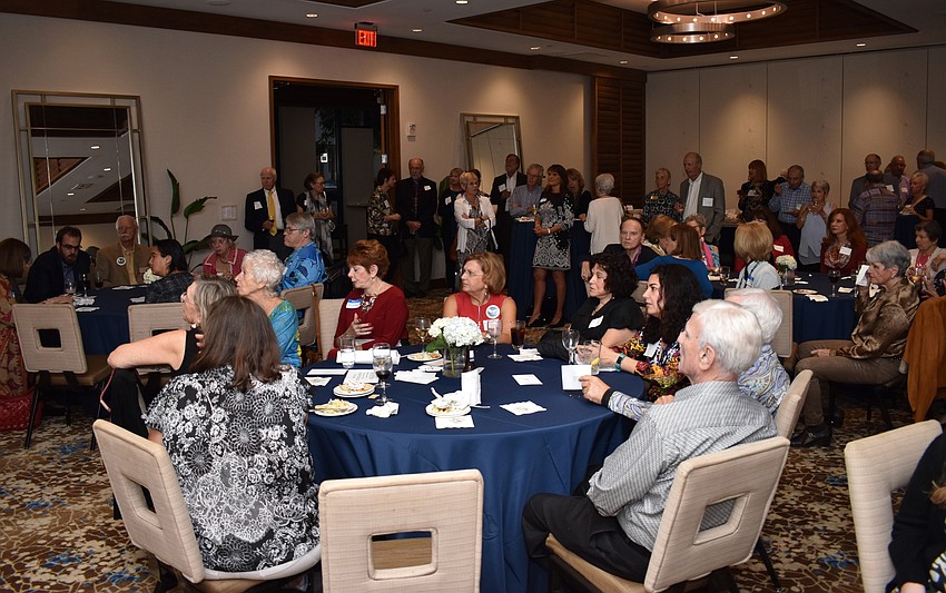 Guests listen to Compeer Founder Bunny Skirboll speak.