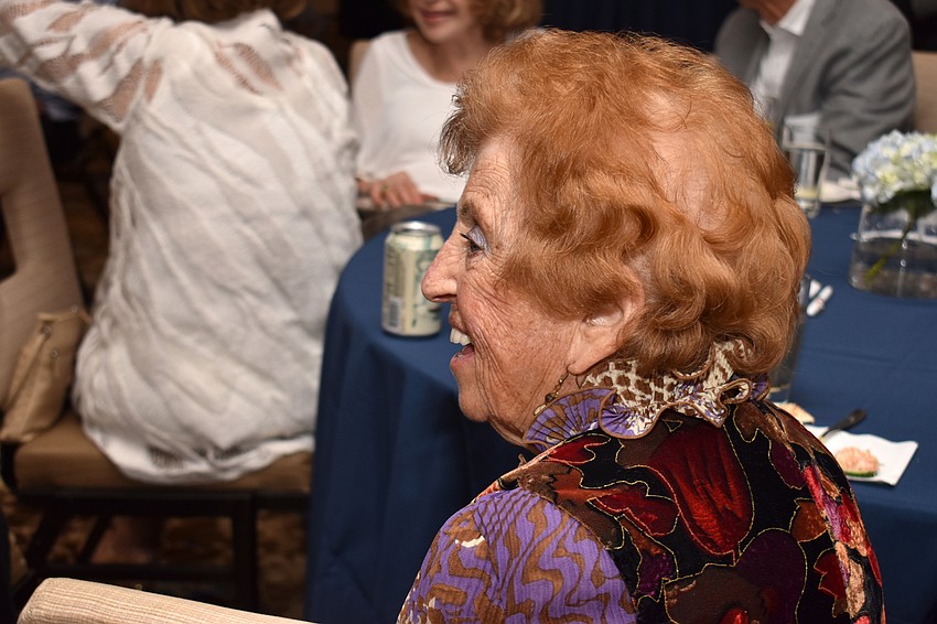 Founder of Compeer Sarasota, the local branch of Bunny Skirboll’s national organization, Ann Hartka laughs during a speech.