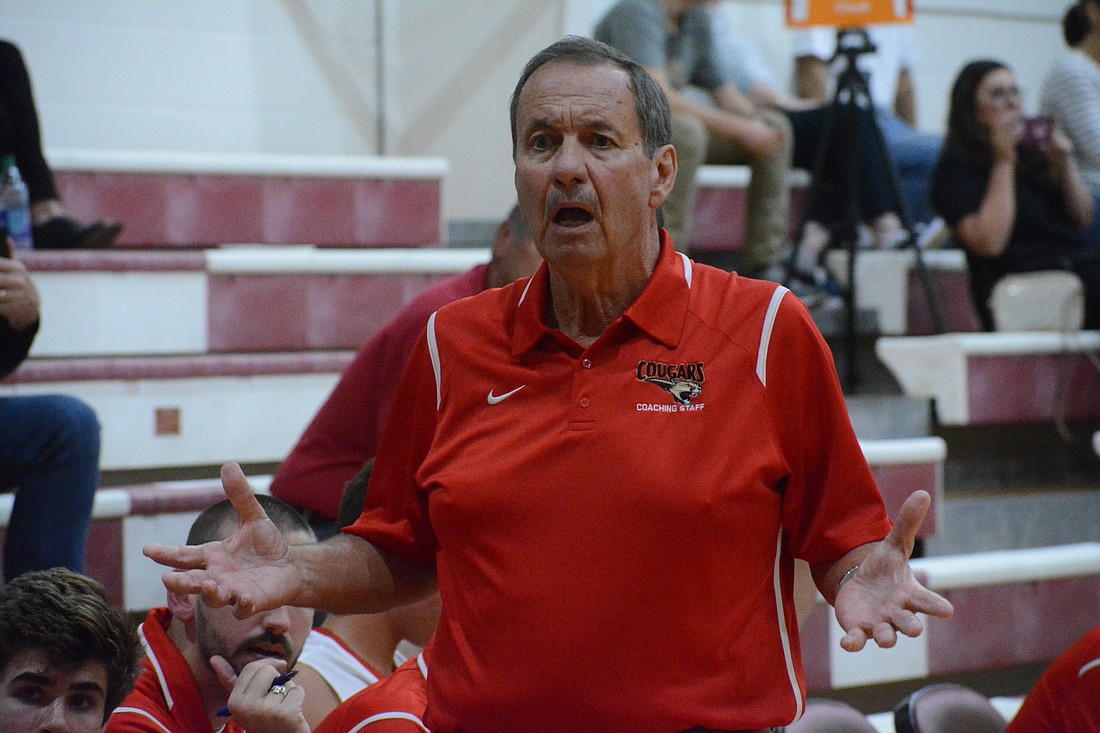 Cardinal Mooney coach Mike Urban asks a referee about a non-call against Sarasota Christian.