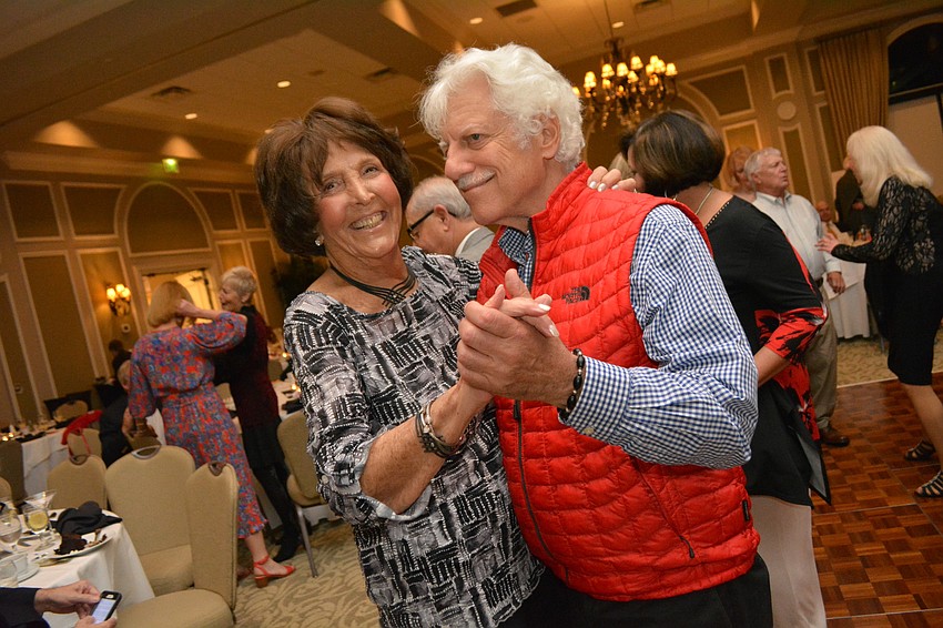 Joan Lawrence dances with her husband Hal Cohen.