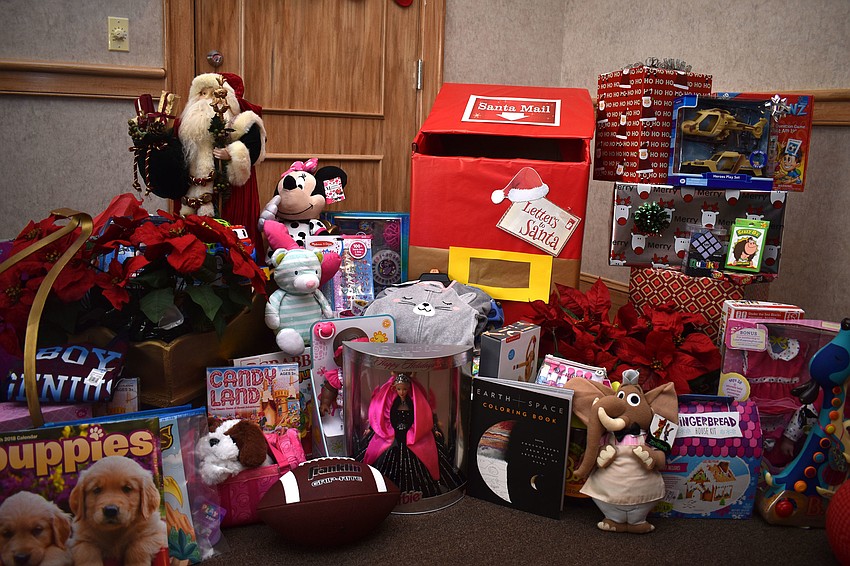 Employees and residents brought toys to donate to the Children’s Guardian Fund.