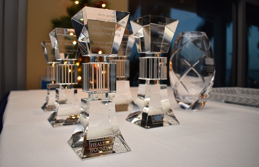 Members inducted into the Doctor of Philanthropy level of the society received an award along with their white coat.