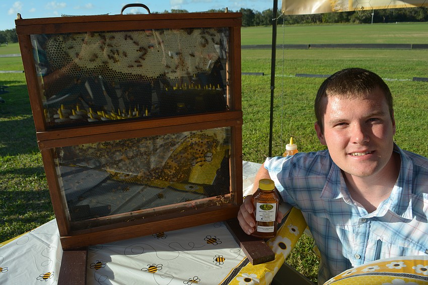 Nathan Aman of Dover brought his honey to the market.