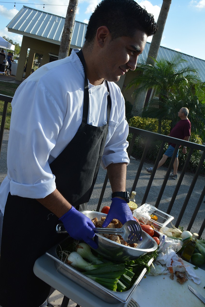 Culinary Innovation Lab at USF chef Franco Valencia puts on a display for the crowd.