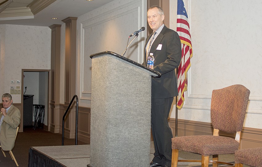 Mental Health Community Centers Chairman of the Board David Fawkes welcomes guests to the annual High Hopes Breakfast on Dec. 7 at Michael's On East.