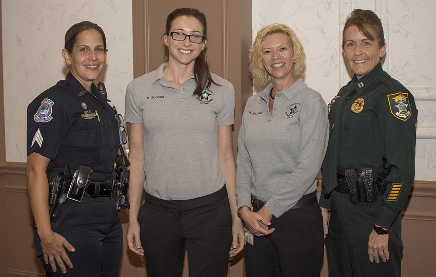 Sgt. Jaymi Delcos, Sandra Goluch, Nancy Williams and Debra Kaspar