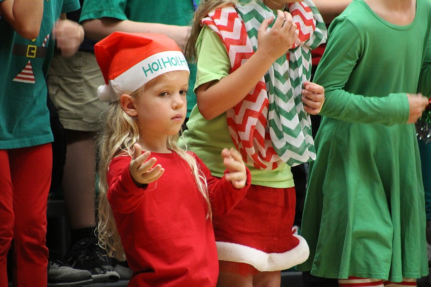 Willis Elementary School third-grader Lily Rudd dances on stage during the holiday show.