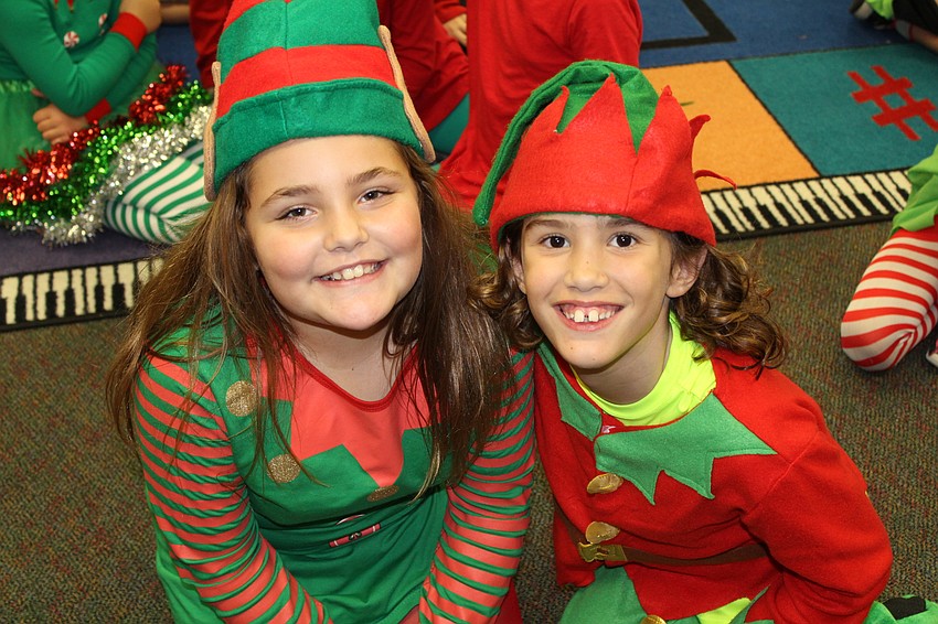 Willis Elementary School third-graders Jenna Schulman and Leila Borghesi get ready for their big show.