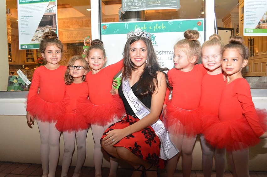 Alexandra Fallacaro, Lakewood Ranch Teen USA, gets between Powerhouse Dance's Willow Farrelly, Makayla Reyes, Alexa Freck, Cayden Stolarski, Brookelyn Albee and Alyssa Rivkin.