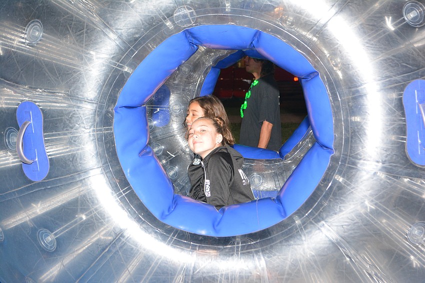 Myakka City sisters Katelyn and Jenna Lee are having a ball at Holidays Around the Ranch.