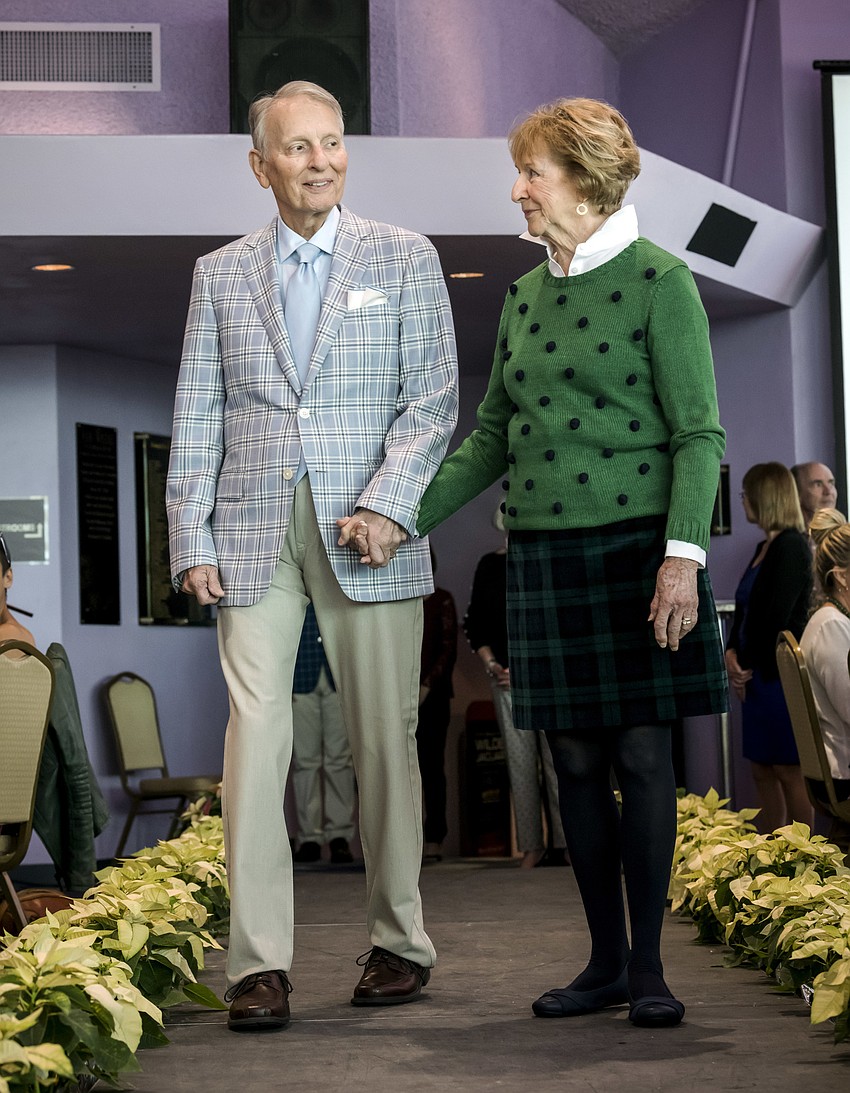 Don and Jean Russell walk the catwalk.