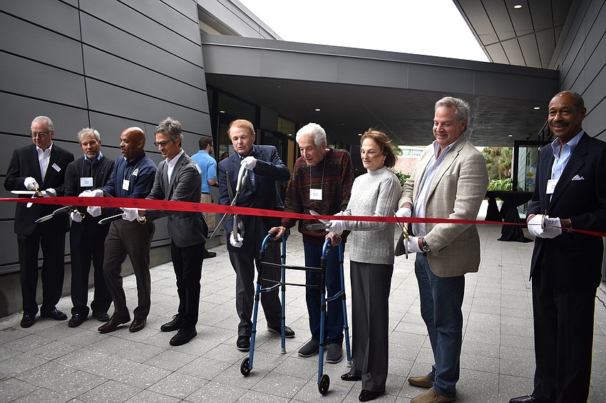 Jerry Sparkman, Ringling College of Art and Design President Larry Thompson, Richard and Barbara Basch, Chairman of the Board of Trustees Dean Eisner and others cut the ribbon.